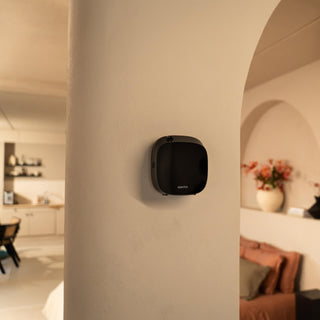 Wally Aroma diffuser hanging on wall in bedroom