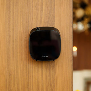 Aroma diffuser black on wooden plate hanging